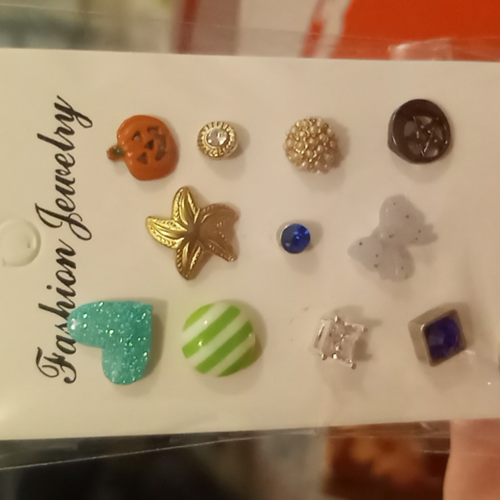 A lot of single earrings